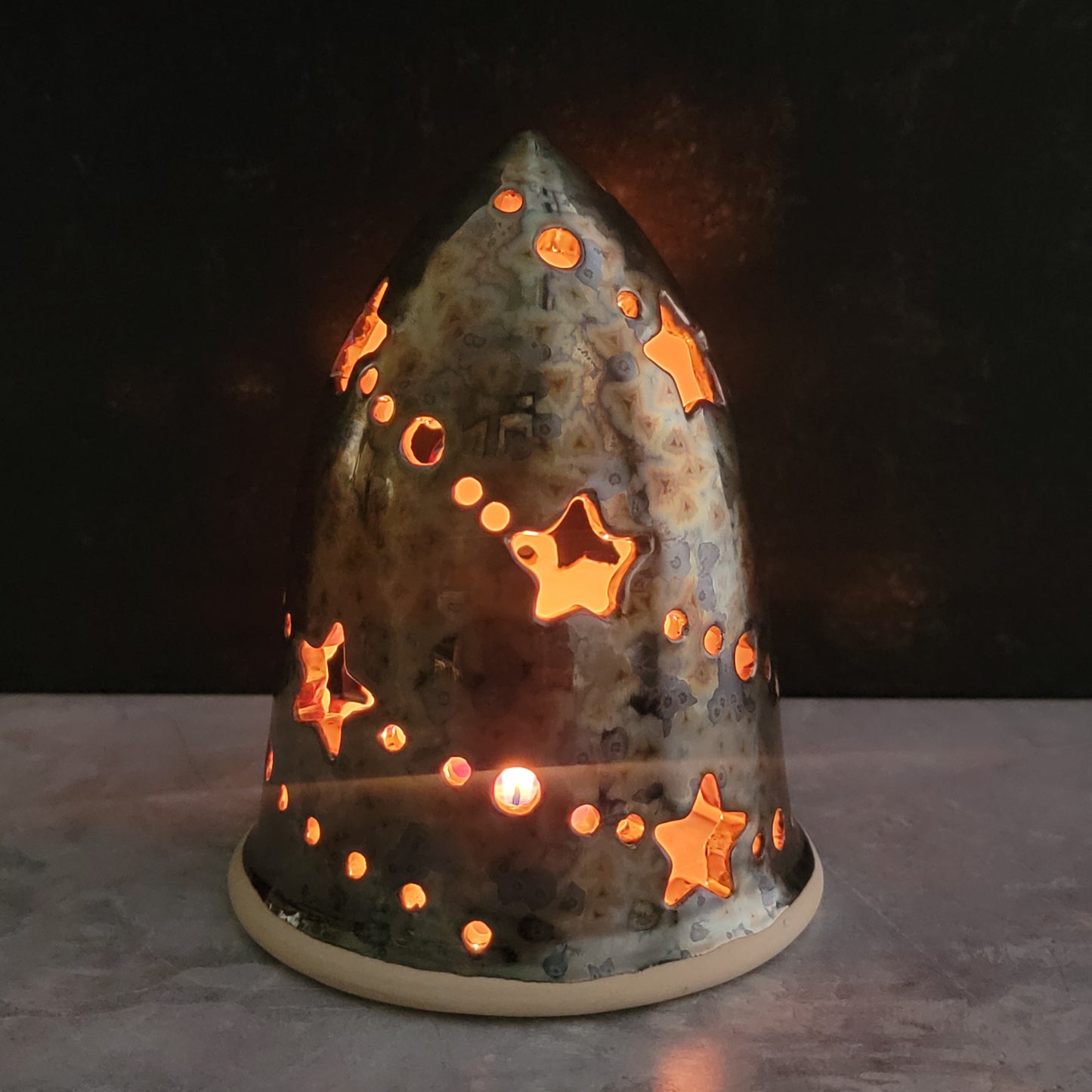 Tree luminary in dark crystal