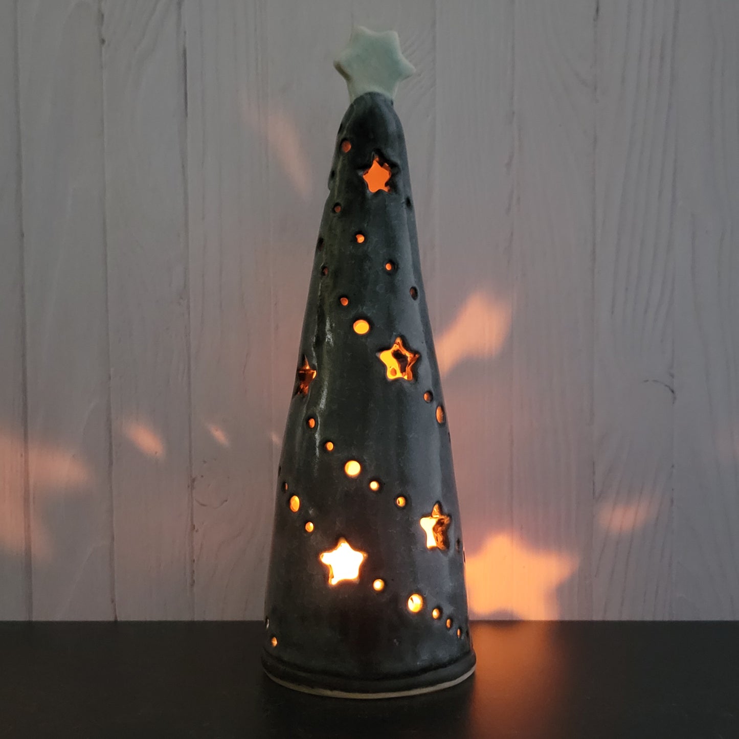 Tree luminary in dark crackle